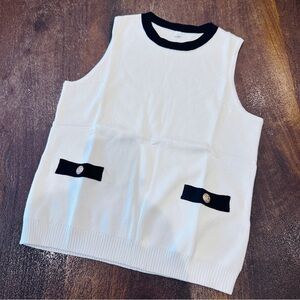 Sleeveless White and Black Top with Button Accents